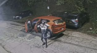 Defiant car thief dances for security cameras