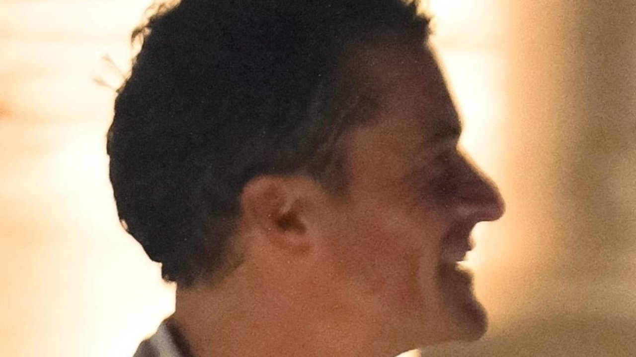 Katy Perry's ex Orlando Bloom hangs with mystery woman at Bezos party