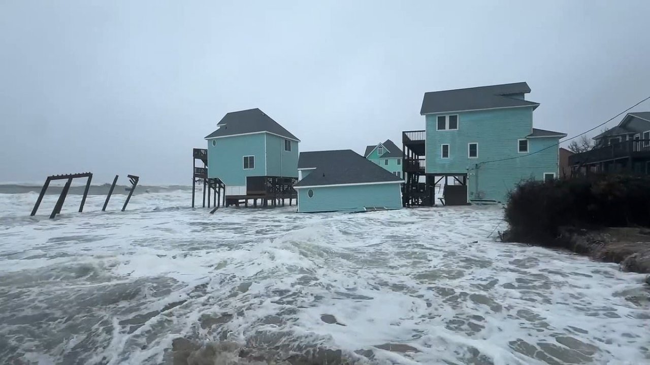 Eroding North Carolina coast swallows four MORE beachfront homes