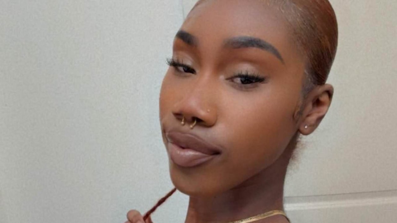 Woman accused of plowing over CORPSE while driving through crime scene